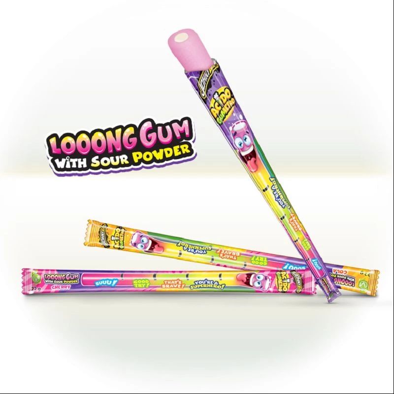 acido-gumetro-chewing-gum-long-poudre-acide Longs bâtons de chewing-gum Acido Gumetro de différentes couleurs (rose, jaune, violet), packaging illustré avec des personnages fun, poudre super acide à l'intérieur.