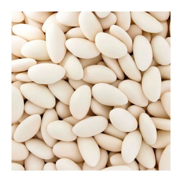 Dragées de luxe à l'amande Avola Marquise de Sicile, coloris champagne ivoire mat, texture lisse et élégante pour mariage ou réception.